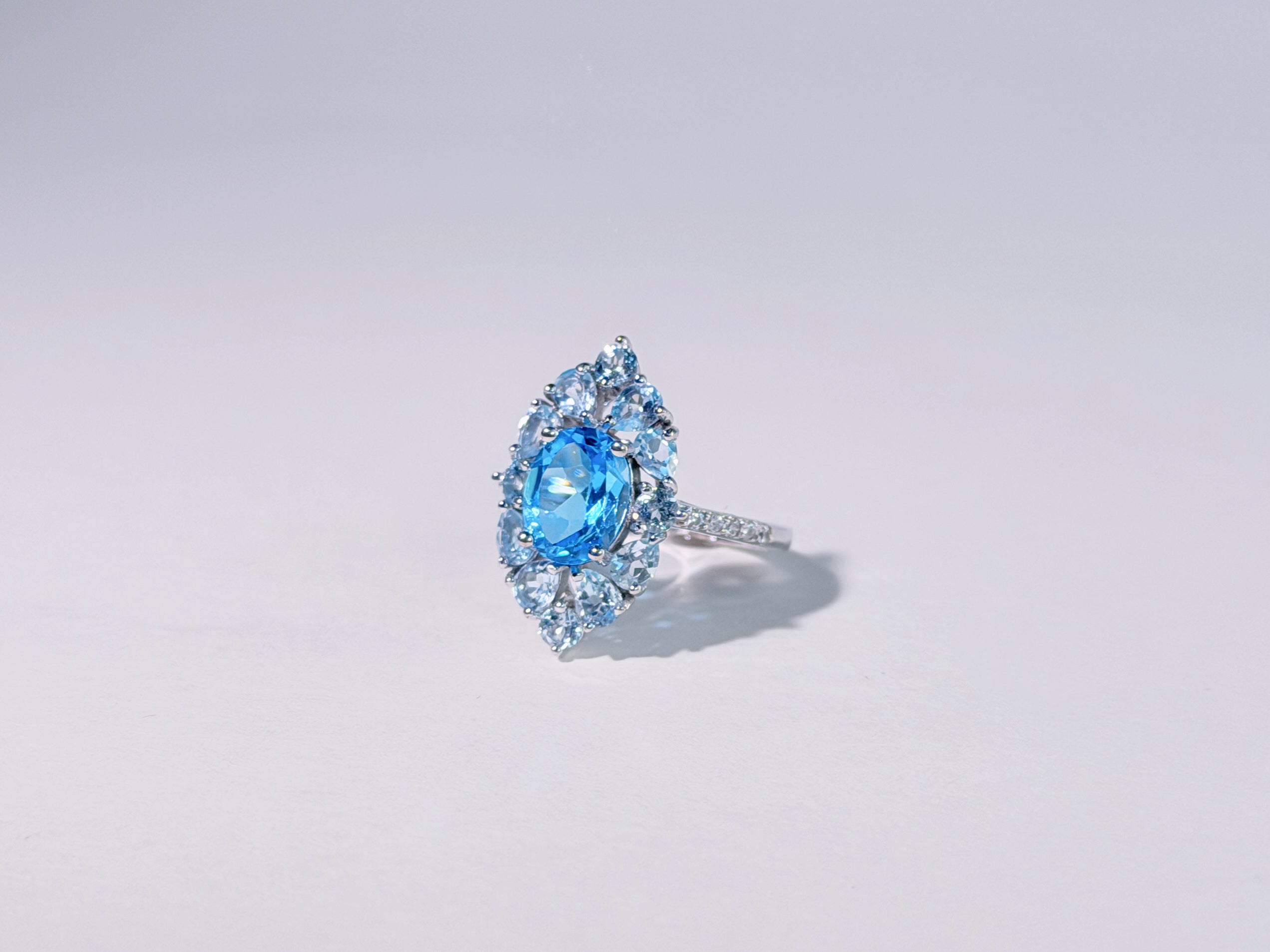 Iris of the Sea Topaz Ring