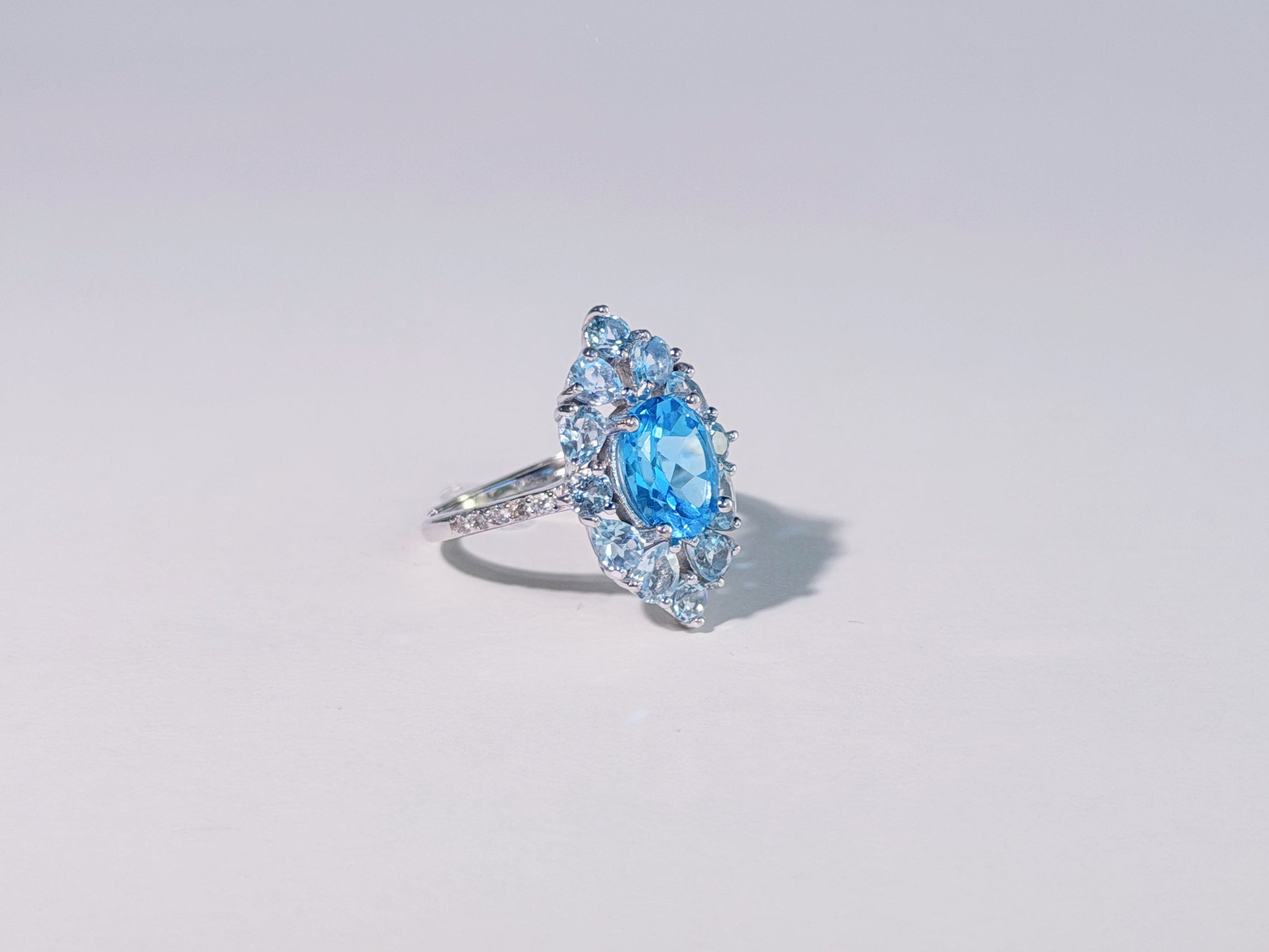 Iris of the Sea Topaz Ring