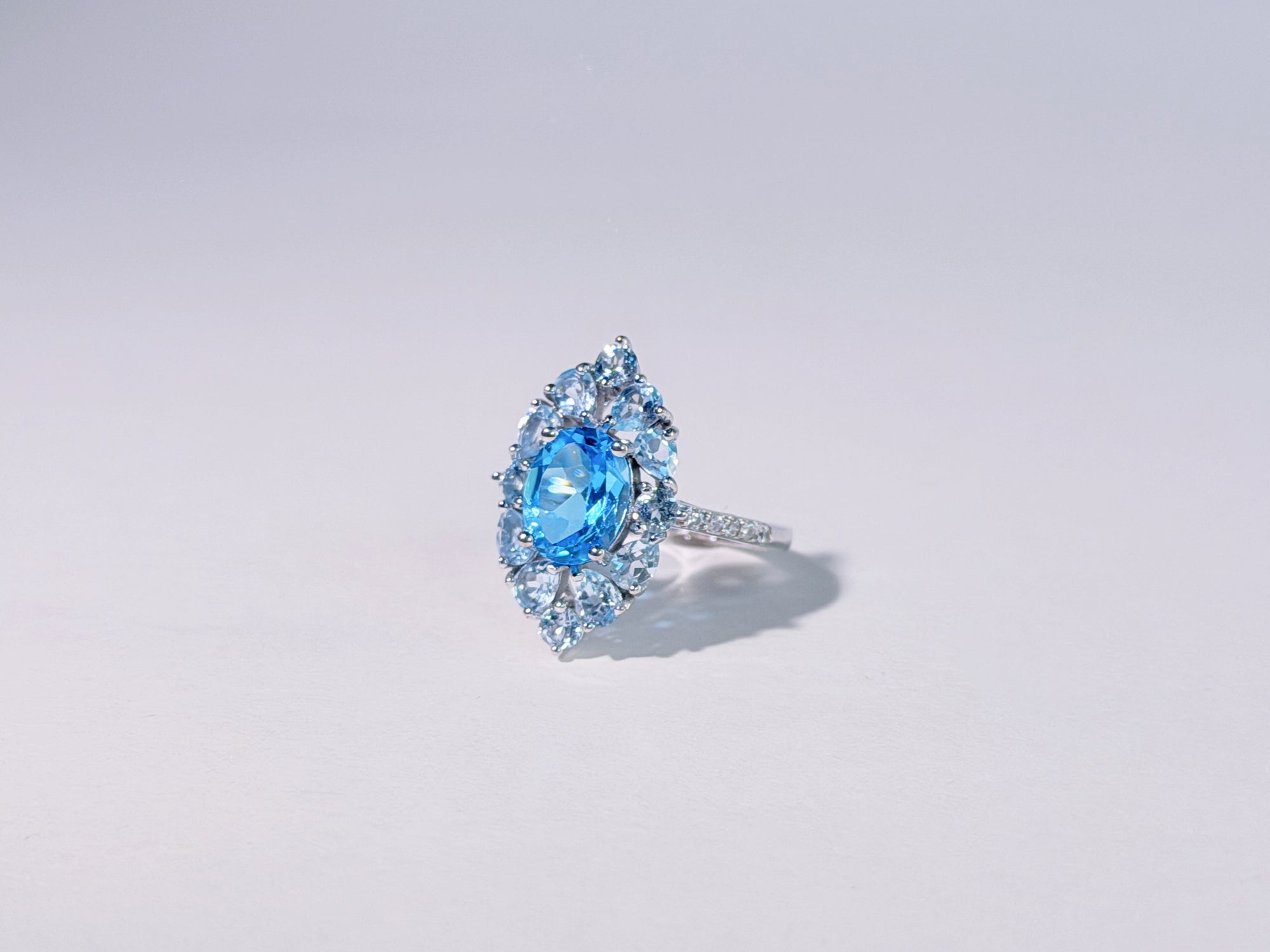 Iris of the Sea Topaz Ring