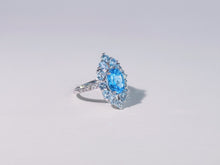 Iris of the Sea Topaz Ring