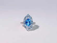 Iris of the Sea Topaz Ring
