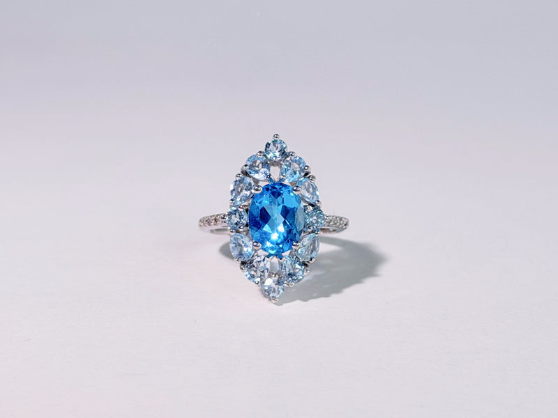 Iris of the Sea Topaz Ring