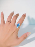Iris of the Sea Topaz Ring
